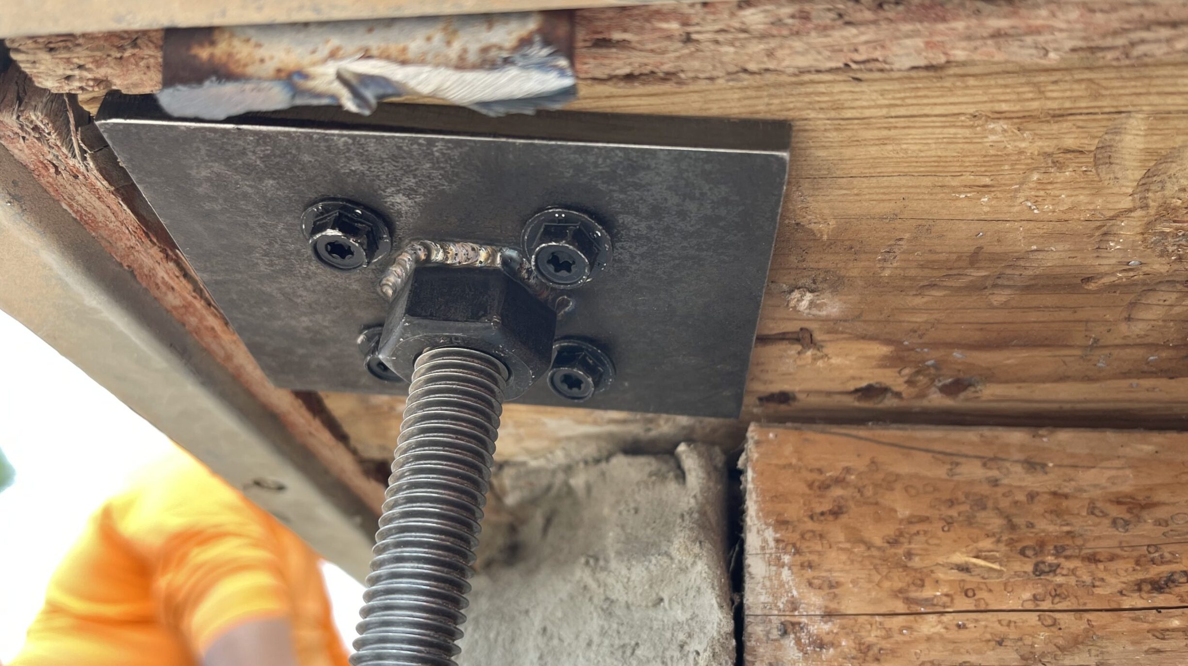 Foundation Repair in Phoenix | Concrete Repairman Technician evaluating foundation crack during Foundation Repair